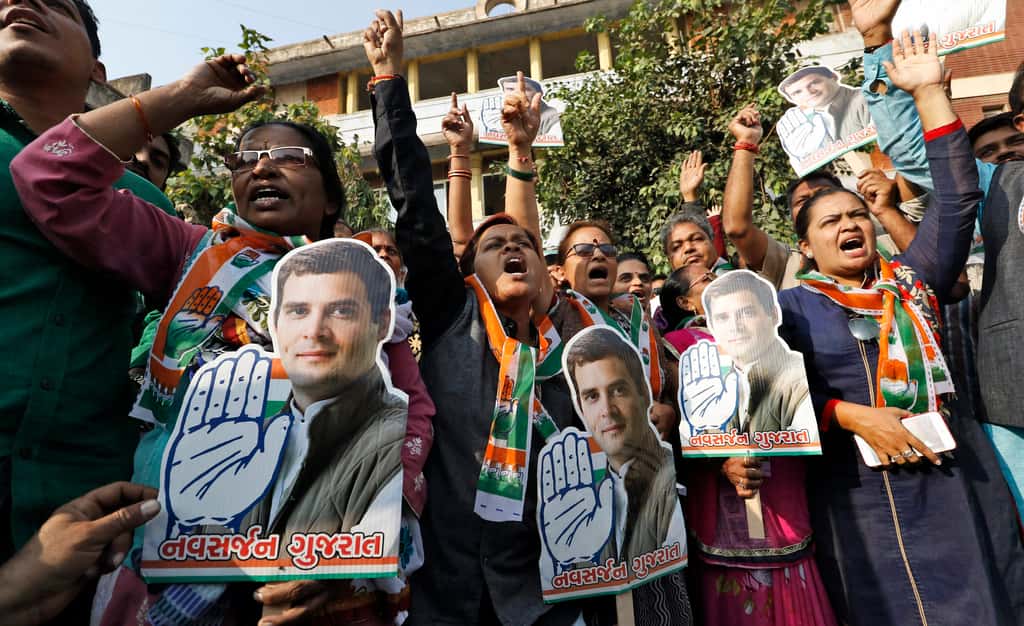 Congress party supporters hold a cut-out of newly appointed party chief Rahul Gandhi, in Ahmedabad on December 16, 2017. (Photograph: PTI)