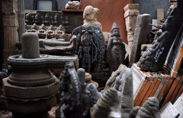 Recovered antique idols and artefacts thought to have been looted by an art dealer at his home in Chennnai in 2016. (ARUN SANKAR/AFP/Getty Images)